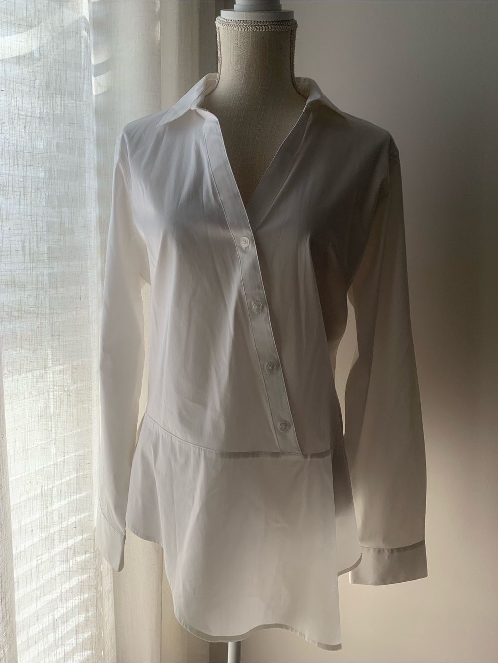 Classic White Button-Front Peplum Blouse with Asymmetrical Design - Picture 7 of 7